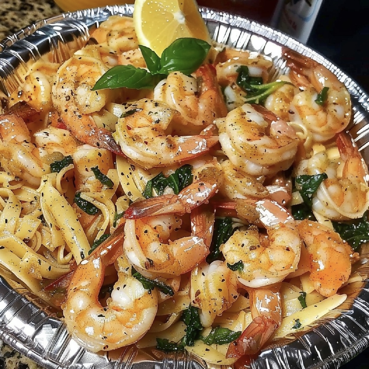 Gourmet Cheese Shrimp Penne Pasta and Spinach on elegant dining table