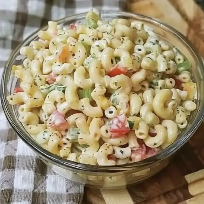 Discover the ultimate macaroni salad recipe - a perfect blend of creamy, crunchy, and tangy flavors. Ideal for picnics, BBQs, and family dinners. Ready in 25 minutes!