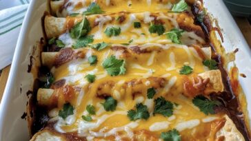 Cream Cheese Enchiladas in a baking dish, ready to serve.