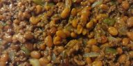 Savory Cowboy Baked Beans in casserole dish ready to serve