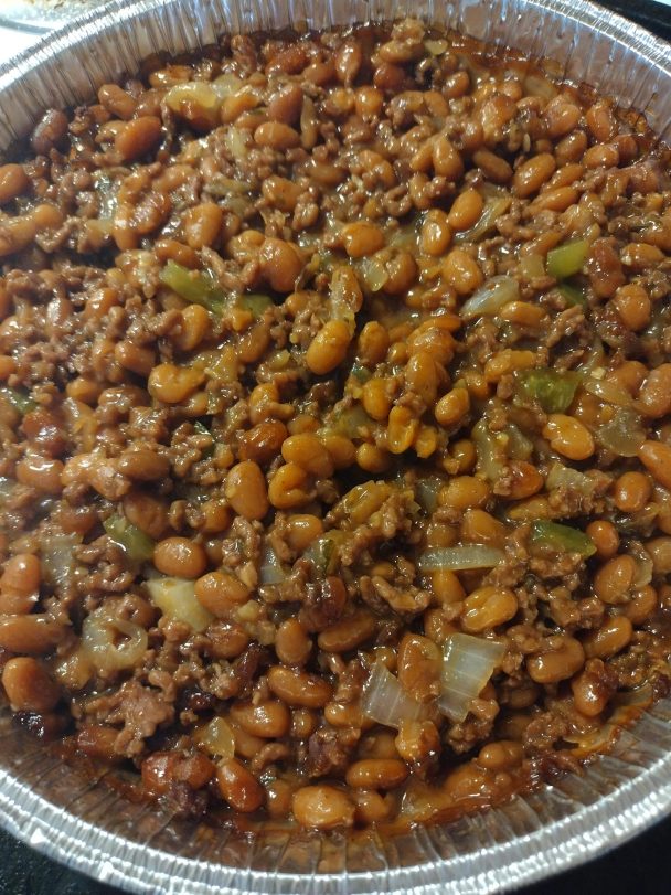 Savory Cowboy Baked Beans in casserole dish ready to serve