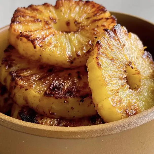 Make this easy 3-ingredient pineapple in your air fryer in just 17 minutes! A perfect sweet addition to any meal.