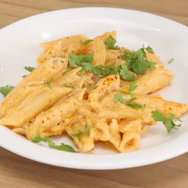 Delicious creamy penne pasta ready to serve