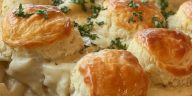 Delicious chicken bubble biscuit bake casserole with tender shredded chicken, creamy sauce, and golden biscuits, perfect for family dinners.